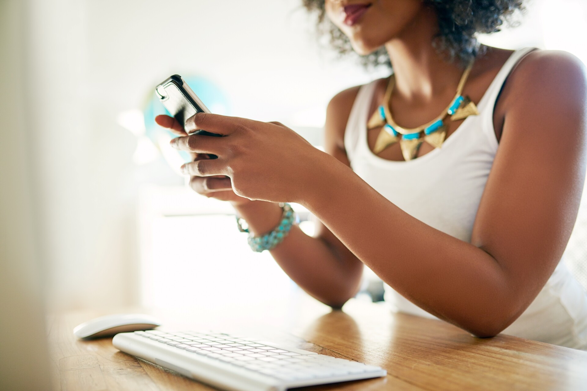 Woman on phone and computer
